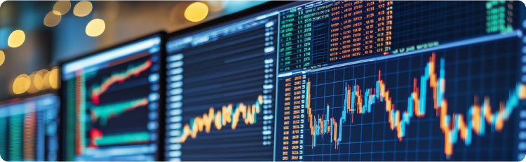 Multiples pantallas mostrando informacion sobre el mercado de las acciones