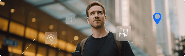Â Pria memegang smartphone dengan ikon keuangan, mewakili tujuan investasi dan pemetaan strategi.