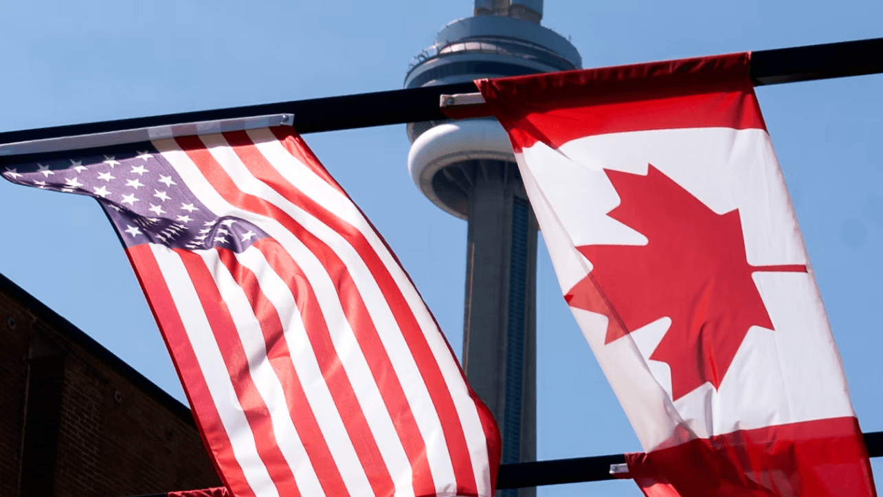Imagen de las banderas de Estados Unidos y Canadá