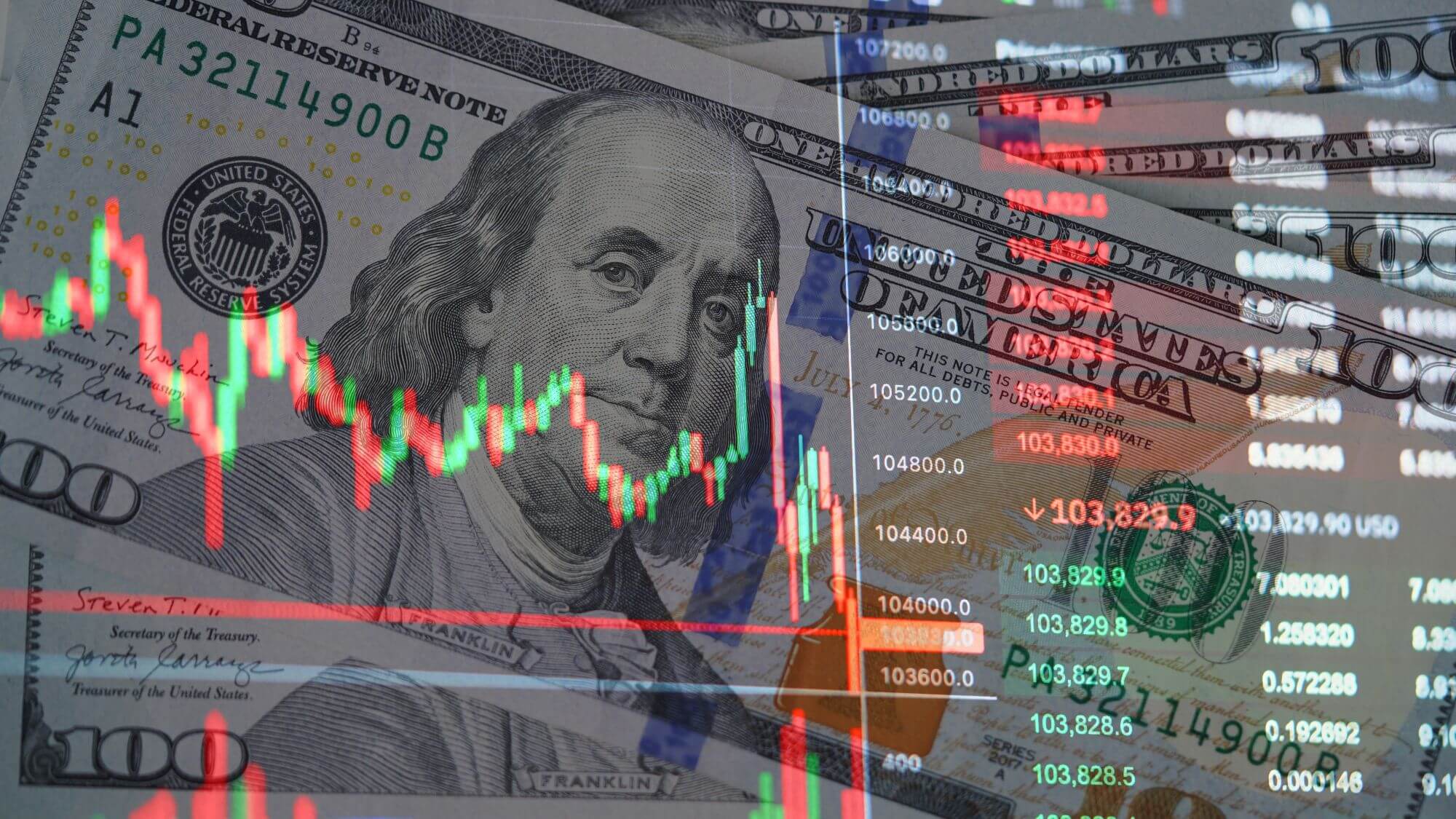 Imagen de un billete sobre el que se ve un gráfico bursátil en un artículo sobre qué es el carry trade