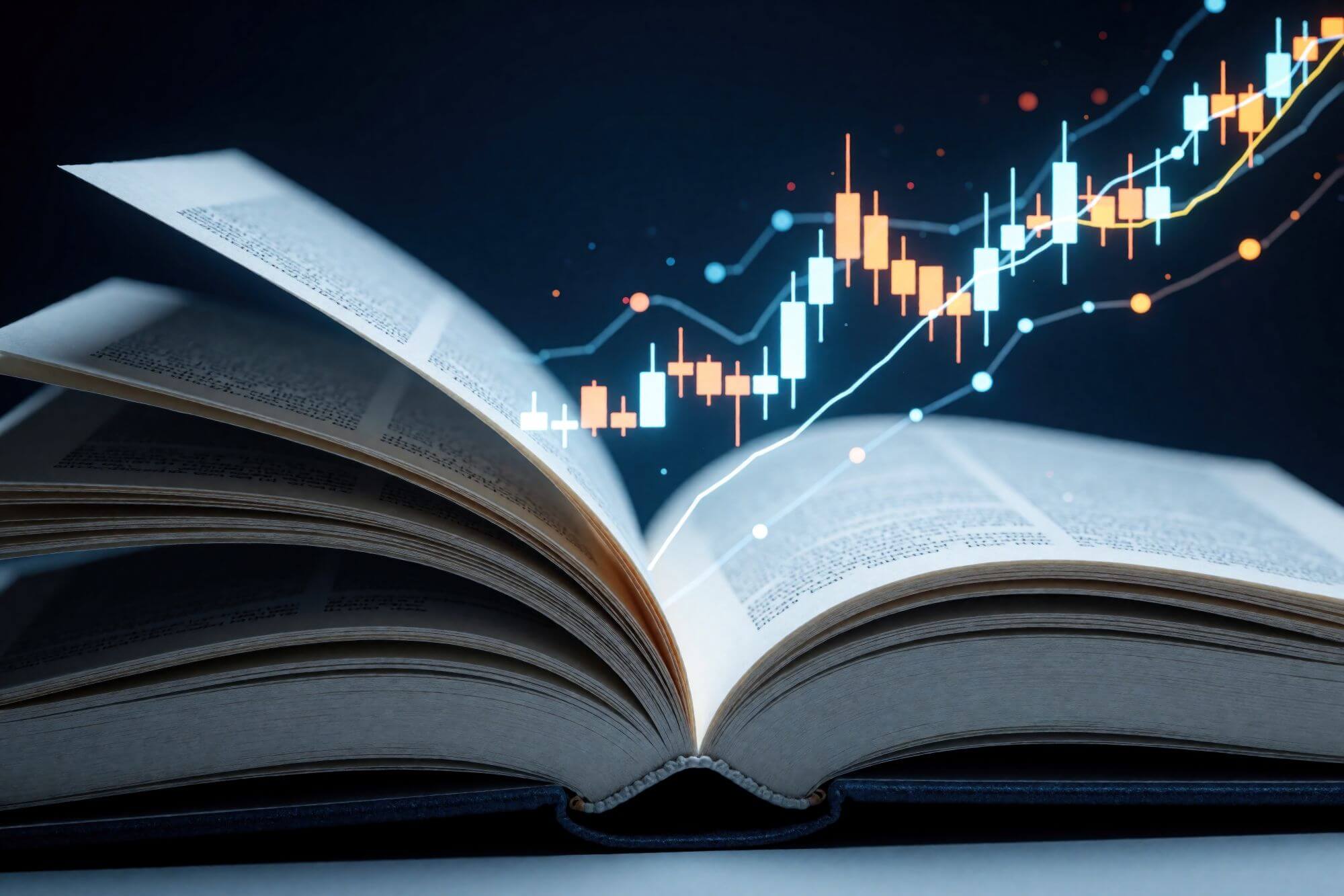 Imagen de un libro abierto sobre el que se ve un gráfico bursátil en un artículo sobre libros para aprender a invertir